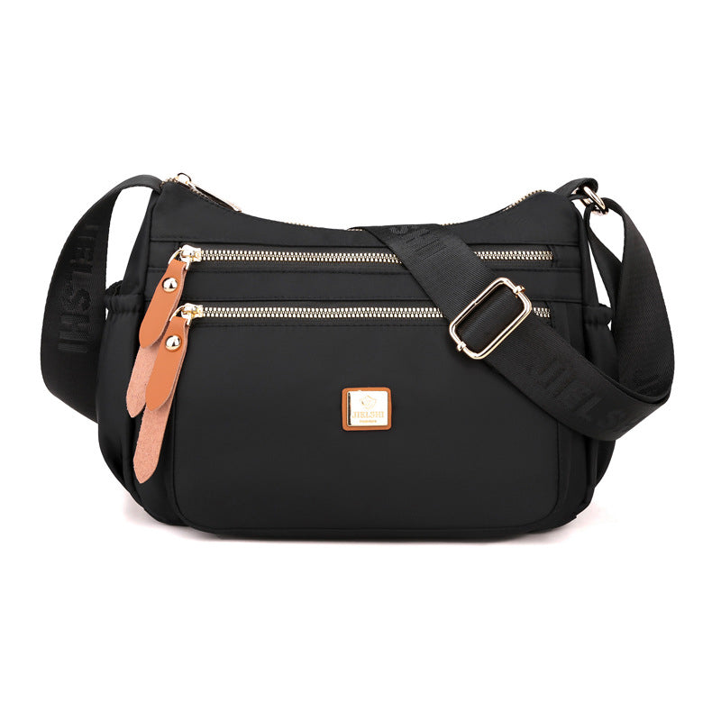 Multi-compartment shoulder bag