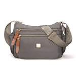 Multi-compartment shoulder bag