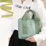 Large capacity multi-pocket handbag