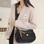 Multi-compartment shoulder bag