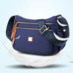 Multi-compartment shoulder bag