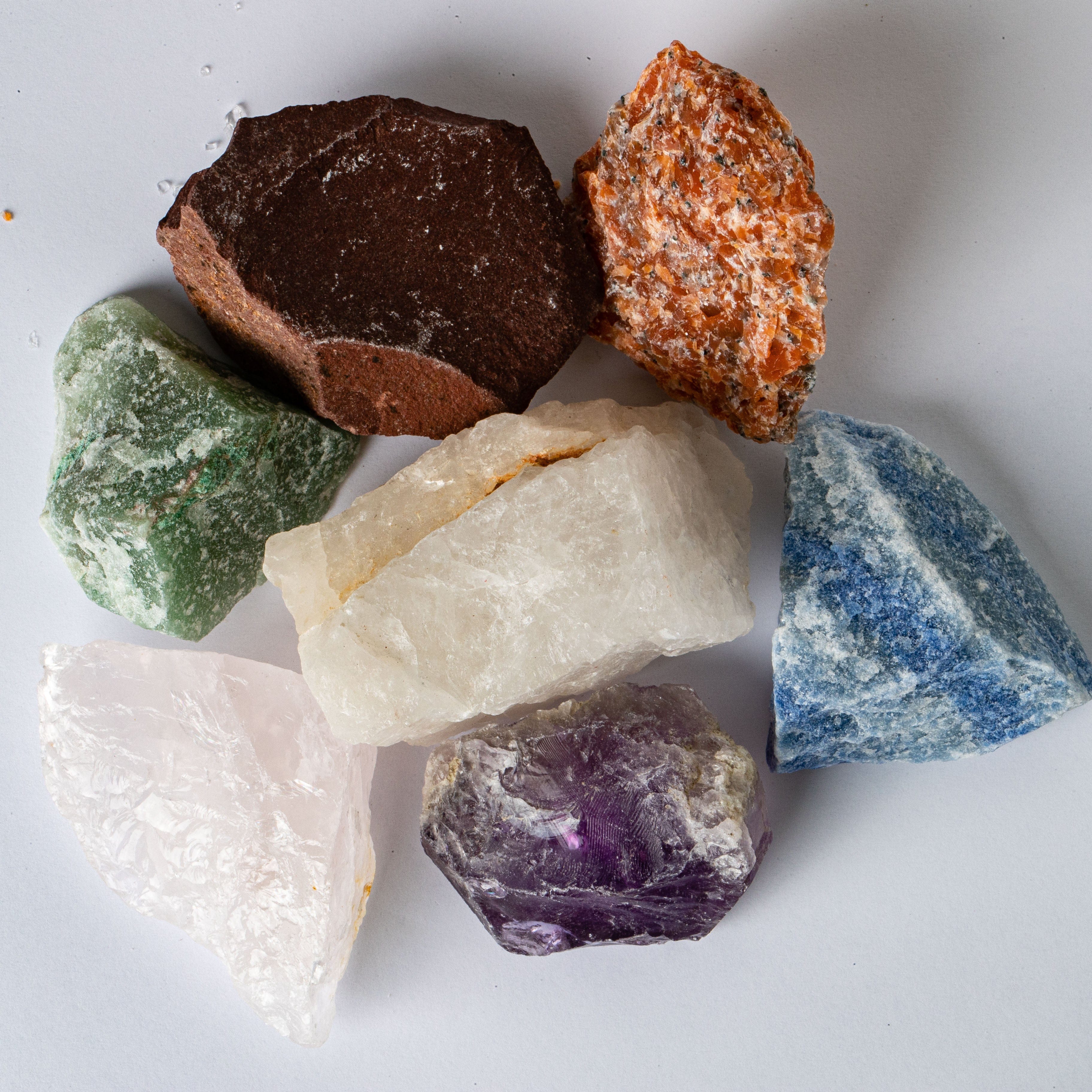 7 Raw Chakra Stones - Tied & Tagged in an Organza Bag