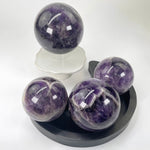 Chevron Amethyst Polished Spheres - By Weight